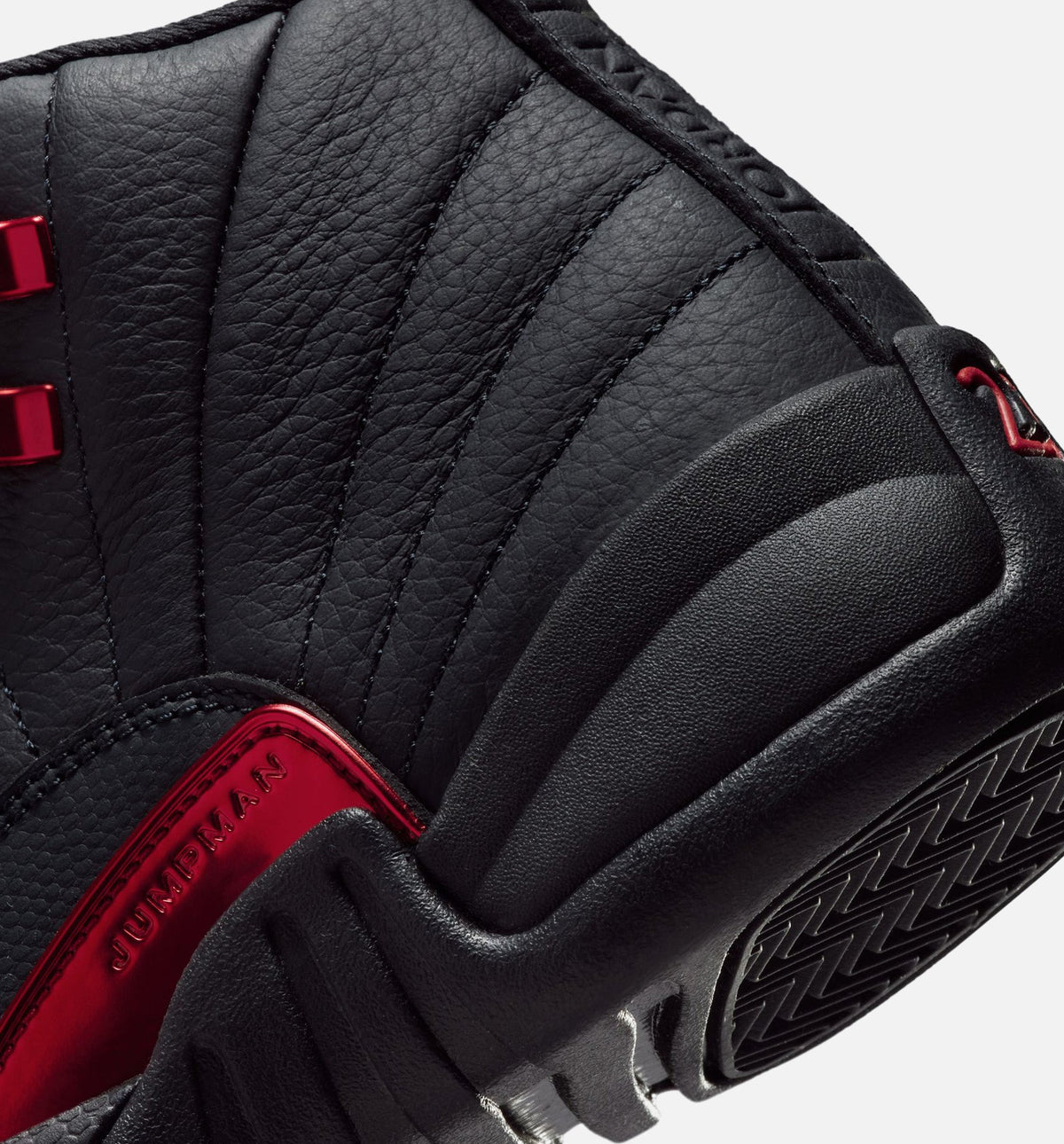 Air Jordan 12 Retro Bloodline – Grade School Lifestyle Shoe in Black/Varsity Red