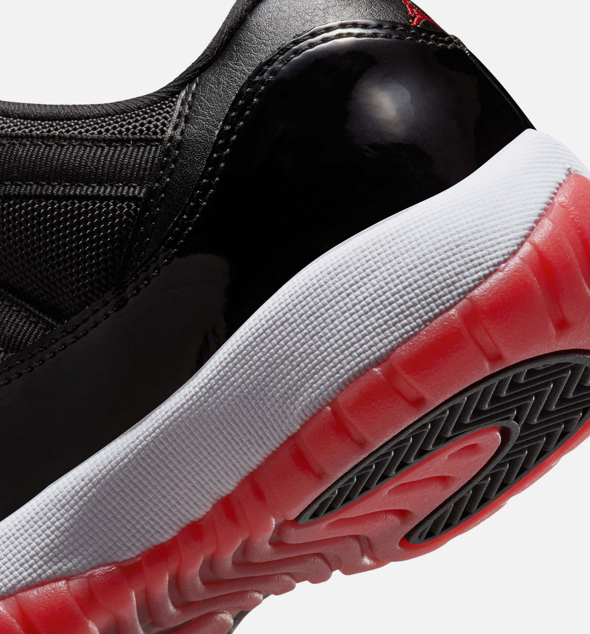 Air Jordan 11 Retro Bred – Grade School Lifestyle Shoe in Black/Varsity Red/White